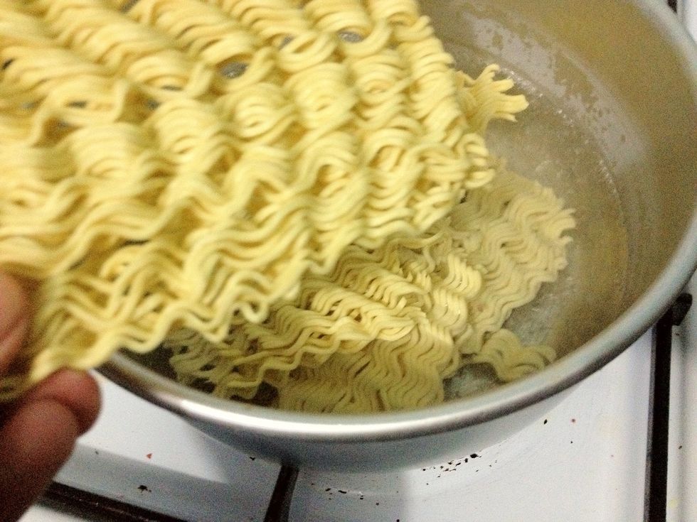Prepare a pan with some water. When boiling,  cook your noodles for few minutes until al dente. If you like to have your noodles with some meatballs, cook them altogether with the noodles