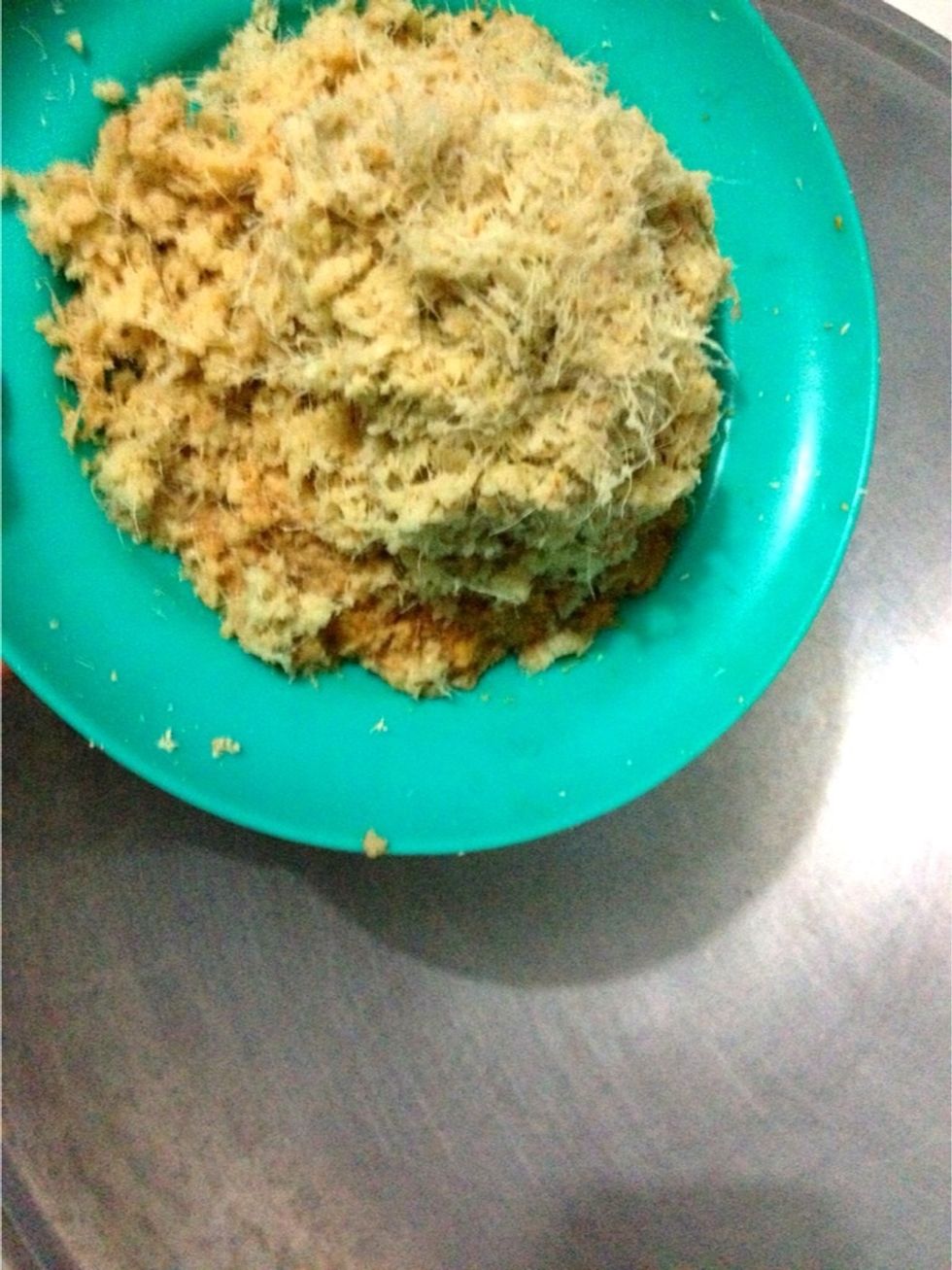 Prepare a wok or sauteing pan. Add in the grated galangal and ginger