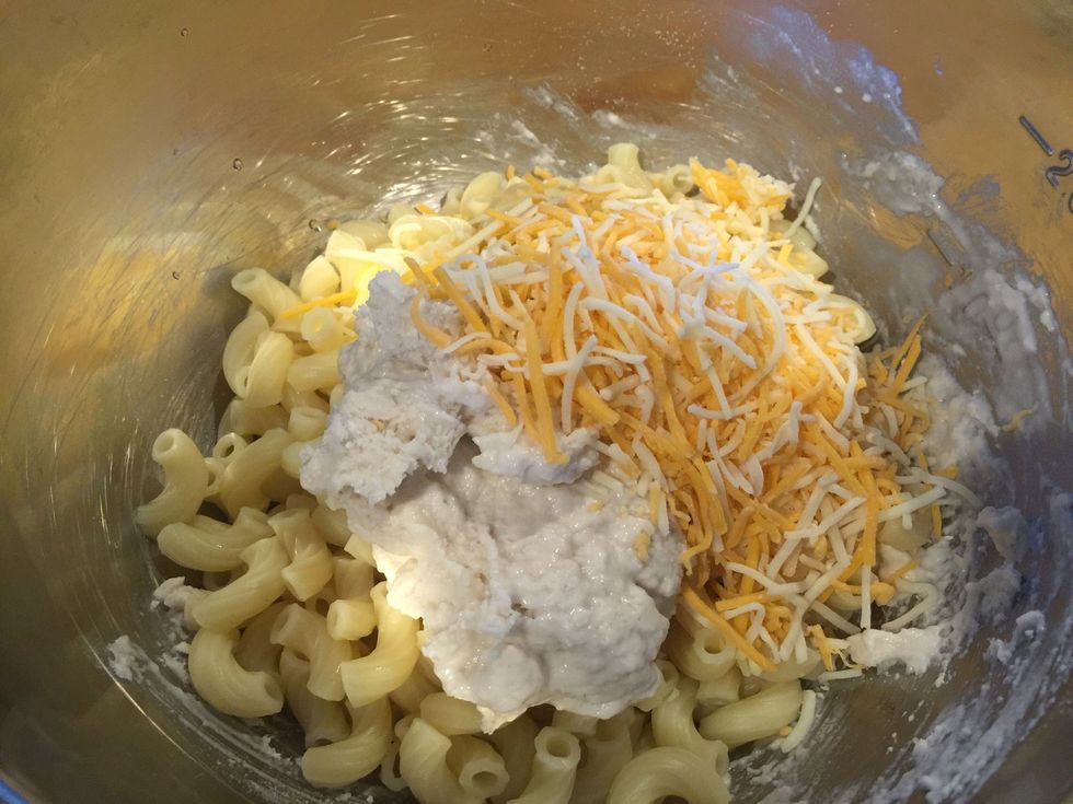 Prepare biscuit mix according to package directions.  I used 1/2 portion.  Then stir everything together:  Biscuit dough, cooked macaroni, shredded cheese, salt and pepper.