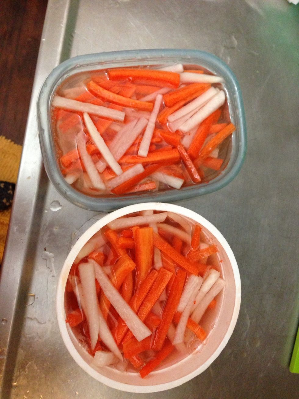 Prepare clean jars. Pack the daikon and carrots tightly into the jars. Pour over the pickling liquid to cover. Seal and refrigerate. This should last for 5-7 weeks.