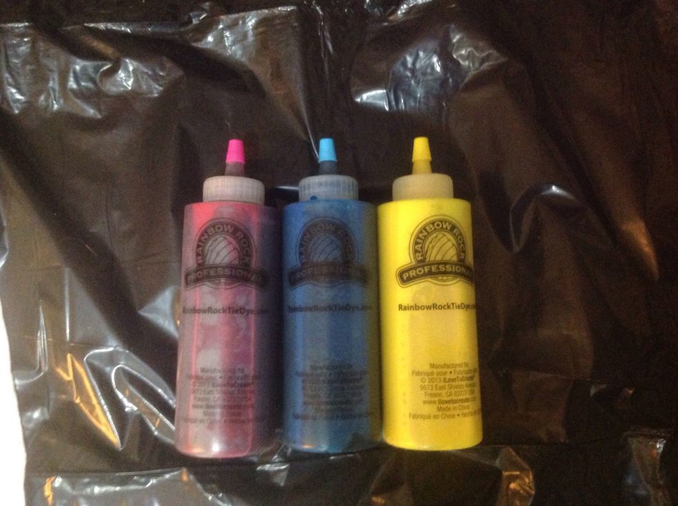 Prepare dye according to kit instructions. This usually states to fill water to the line indicated on the bottle and shake.