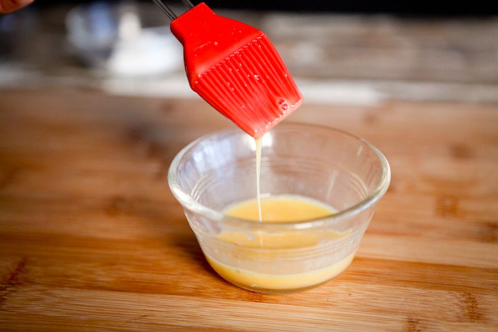 prepare egg wash by whisking one large egg.
