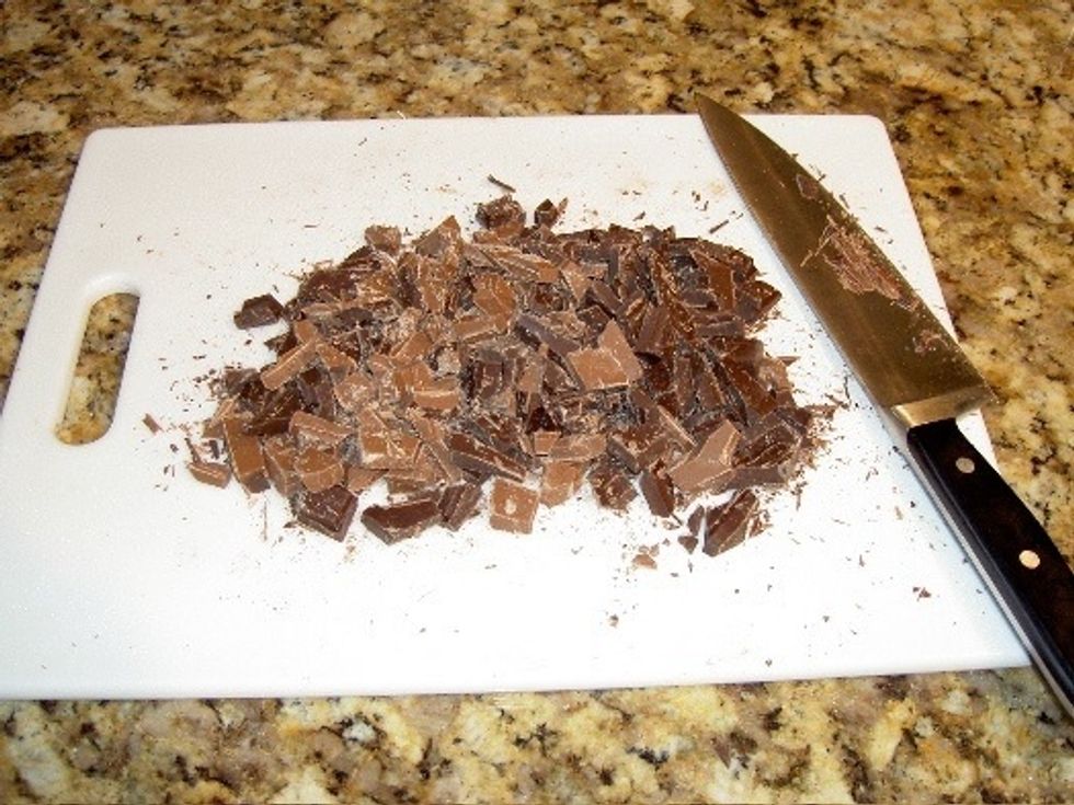 Prepare frosting. Coarsely chop chocolate. Bring cream and butter to boil over medium heat. Remove from heat and whisk chocolate until melted. Transfer to bowl and let cool at room temperature.