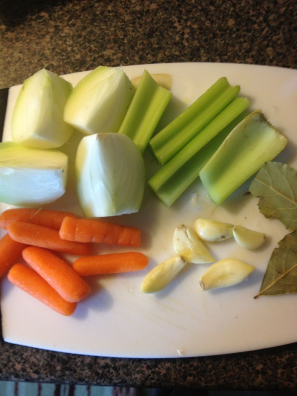 Prepare ingredients by roughly chopping vegetables