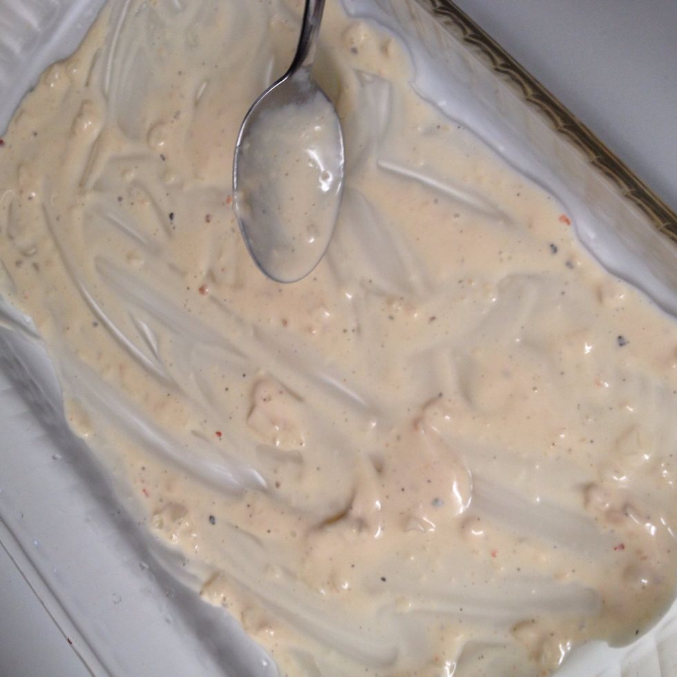 Prepare ingredients to layer your lasagna... In a 13"x9" pan or dish, spread alfredo mixture on the bottom, to prevent lasagna from sticking.