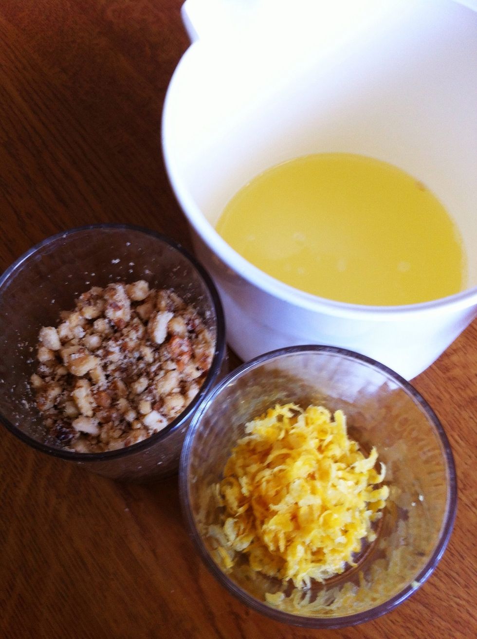 Prepare other ingredients: grated lemon rind, chopped nuts, etc.