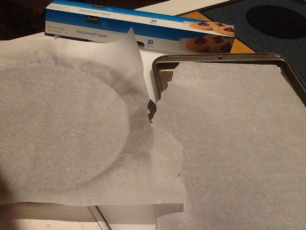 Prepare pan with parchment paper. We like traditional round pizza.