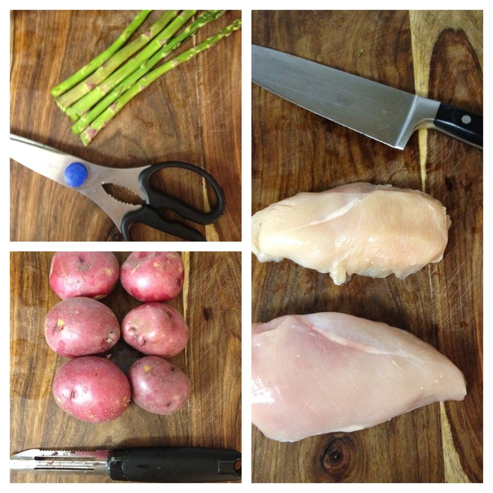 prepare potatoes, asparagus, and chicken. peel off eyes of potatoes, cut off tips of asparagus, and trim up the chicken.