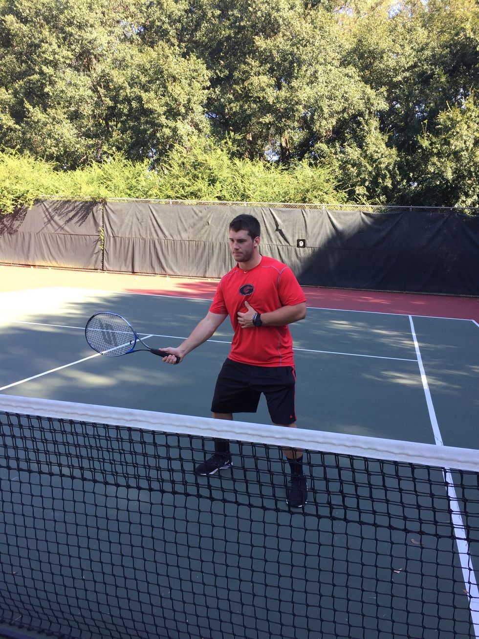 Prepare racket to return ball:open your body to receive the ball