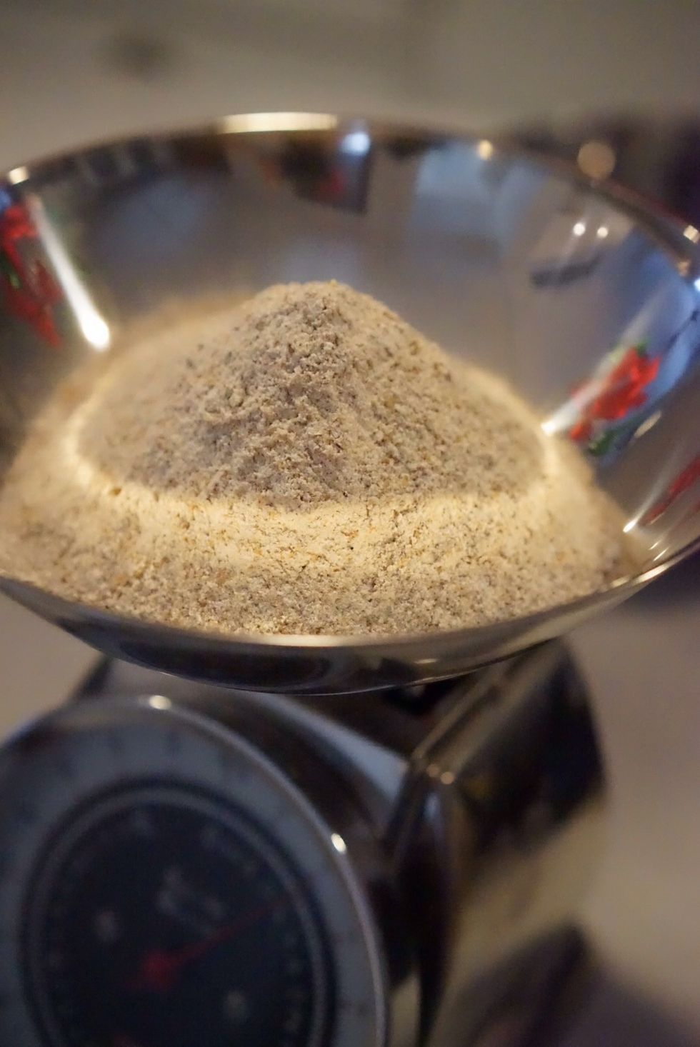 Prepare the dough by weighing 416g bread flour...