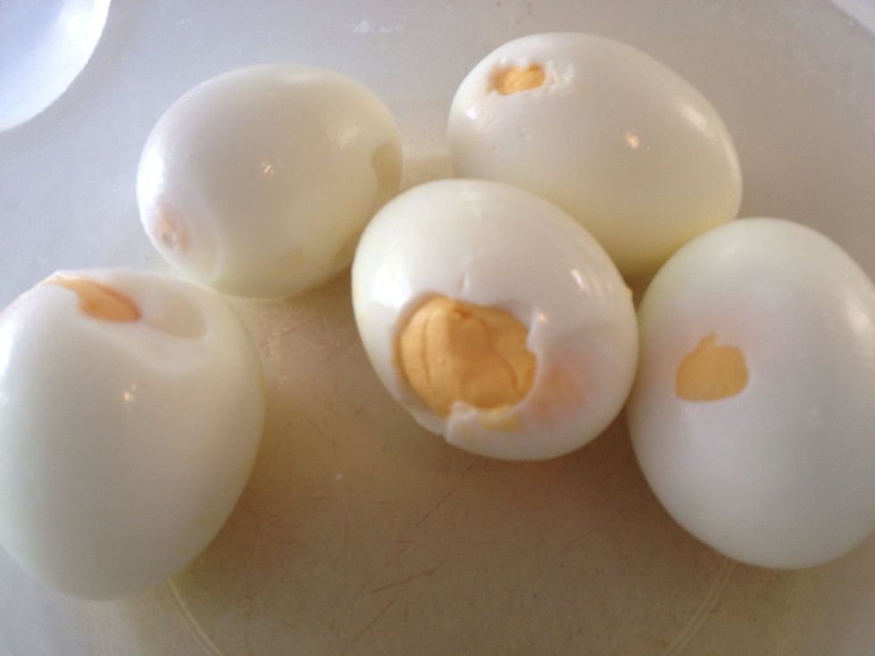 Prepare the hard boiled eggs in advance: put the eggs in a pot, add cold water, bring to a full boil, turn the heat off and let sit for 15 minutes. Then move the eggs to ice cold water. Peel when cold