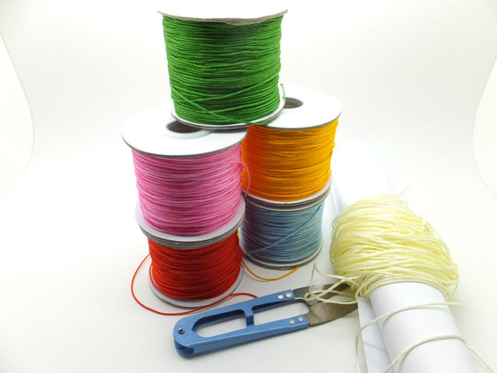 Prepare the Materials: No.72a cords 5meters,No.72 yellowish cord 1meters 925 Sterling Silver Leaf-shaped Charm Pendants 2 925 Sterling Silver Hollow Bead 1 Scissor, Measuring tapes