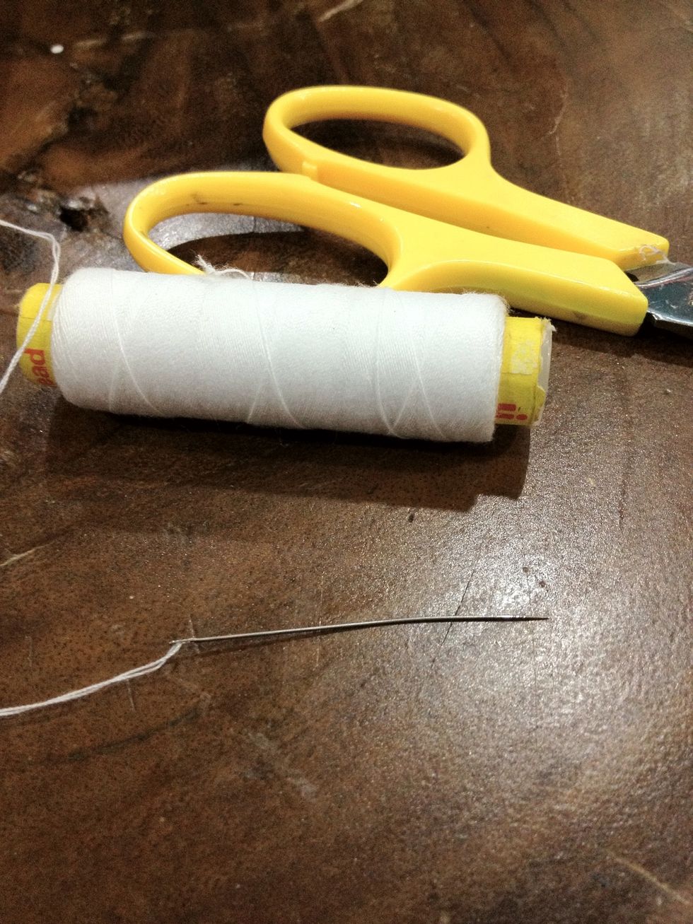 Prepare the needle and thread. Double the thread so it will not break easily.