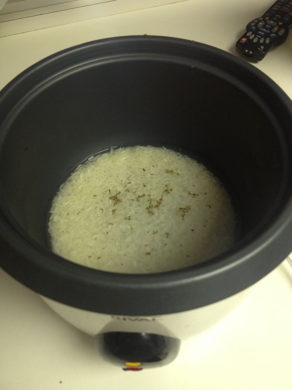 Prepare the rice as normal and just pour the seasonings into the rice cooker!  Don't use too much.