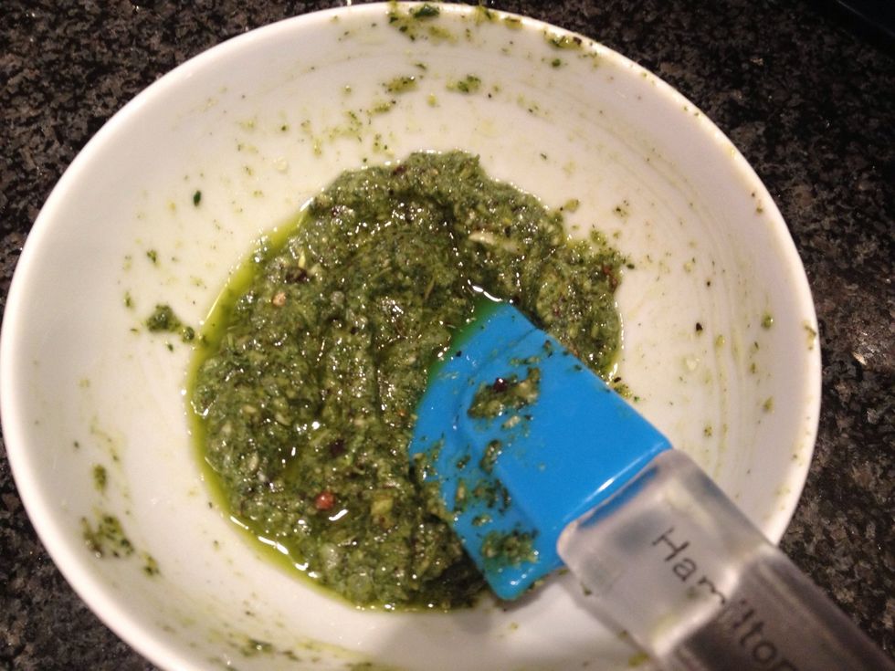 Prepare the rub marinate first so the flavors can blend until you finish removing the fat from the rib roast. Chop and mix 6-8 late cloves of garlic, a bunch of thyme, and 5 tbspn of olive oil.