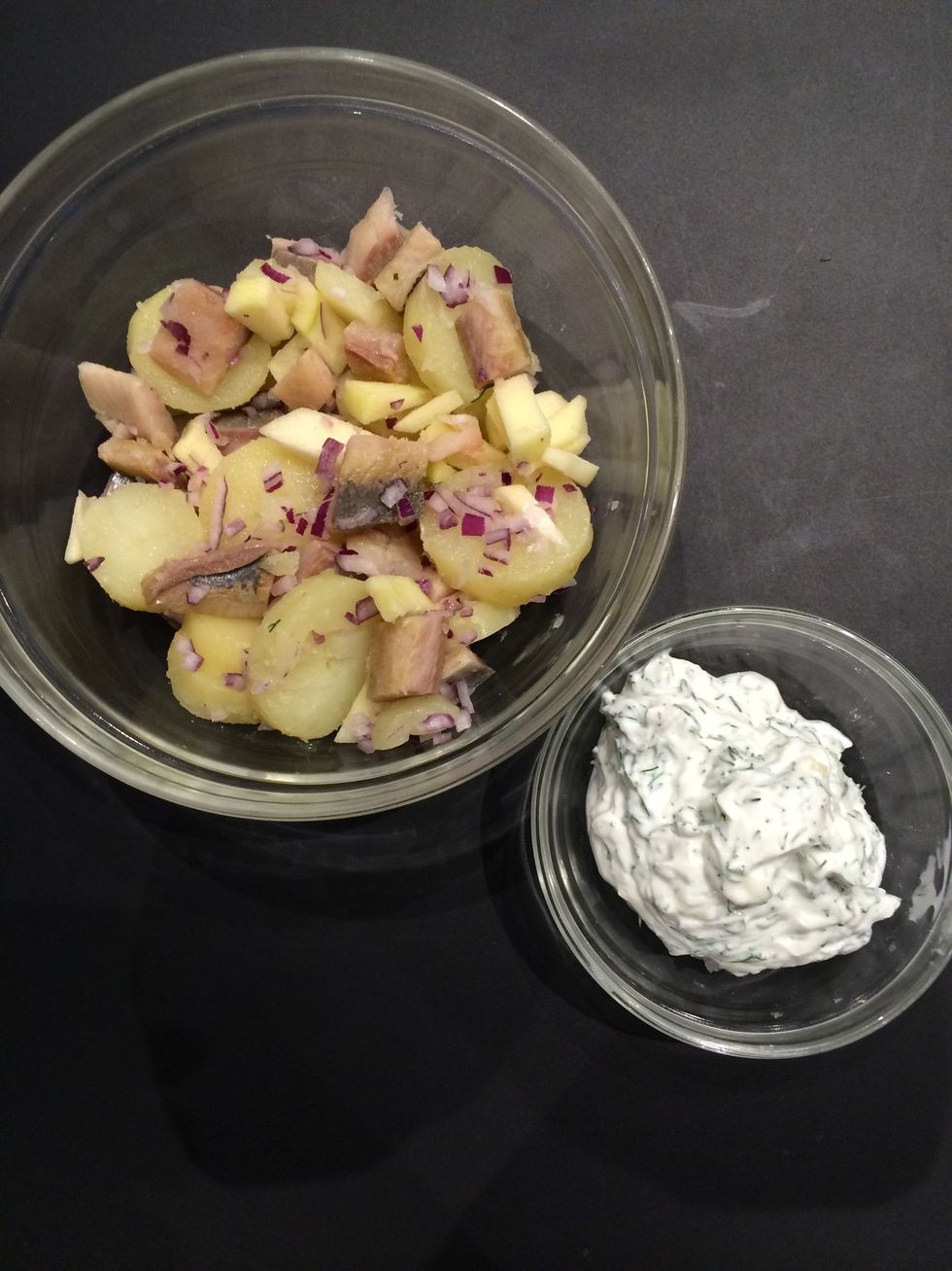 Prepare the sauce cream or yogurt with the dill. Don't add salt because the herrings already have salt