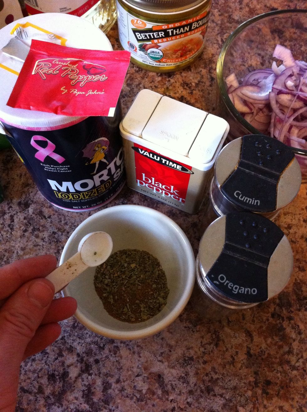 Prepare the spice mixture by combining 1 teaspoon of salt, 1/2 teaspoon of black pepper, 1/2 teaspoon cumin, 1 teaspoon oregano, 1/2 teaspoon red pepper flakes, and a pinch of sugar.