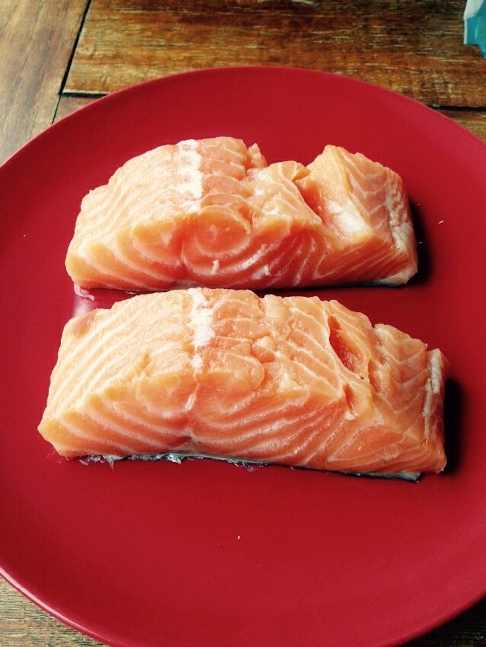 Prepare the two salmon fillets removing any bone you can see