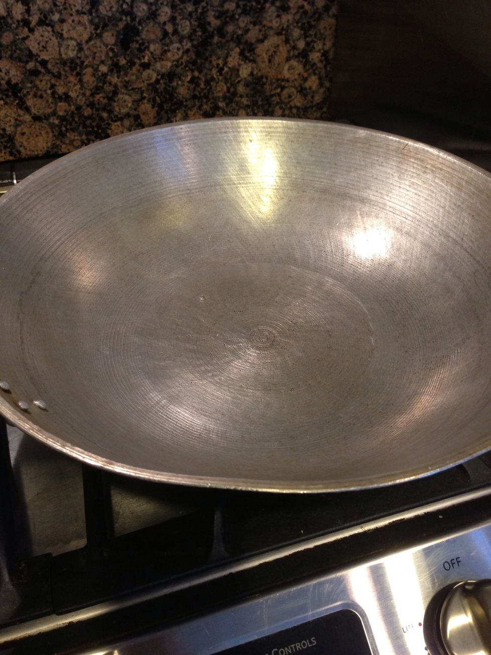 Prepare wok with hot oil