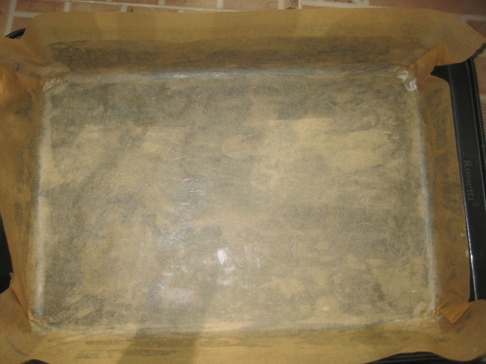 Prepare your baking sheet by greasing the tin first then lining with parchment paper. This is optional and you can leave out the paper when u want to serve the cake straight from the tin.