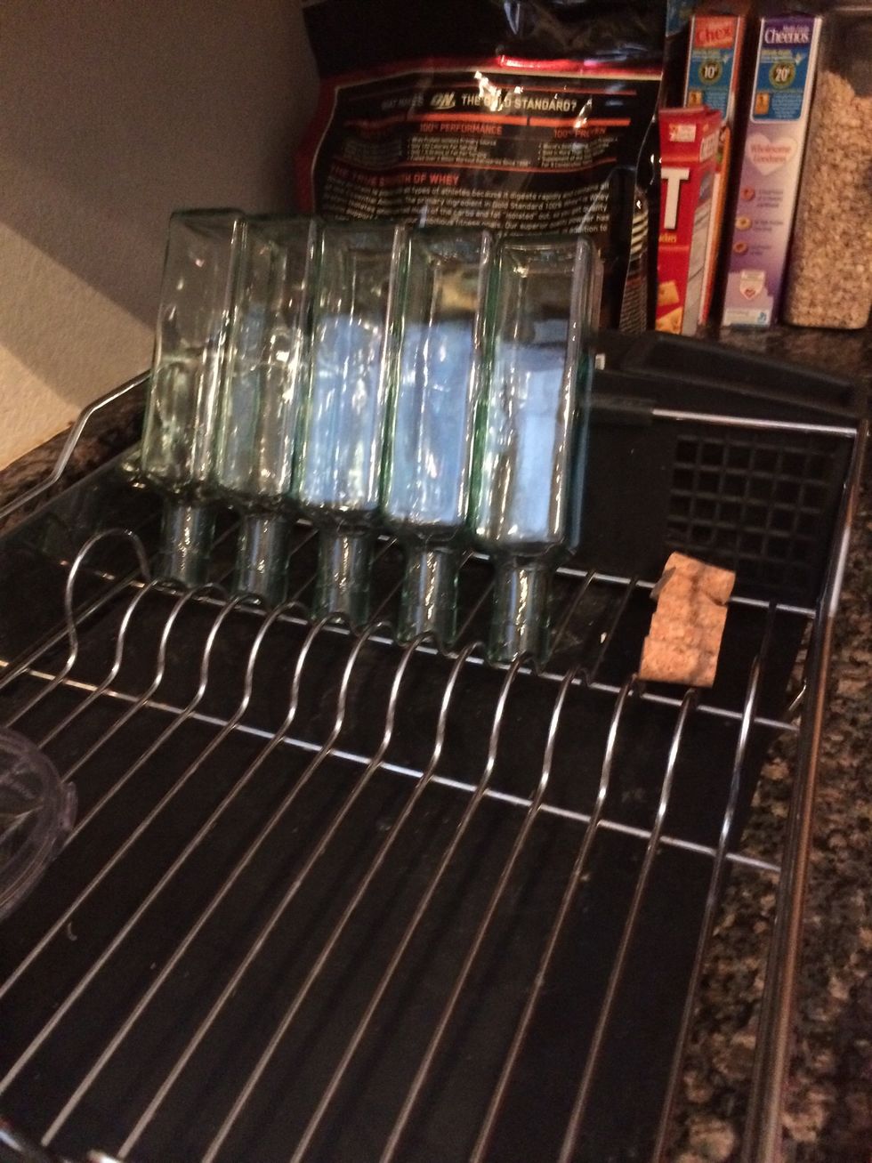 Prepare your bottles by washing and drying them.