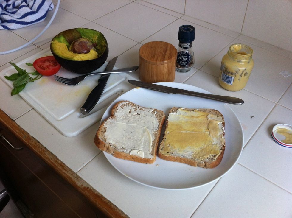 Prepare your bread with mayo and mustard to taste.