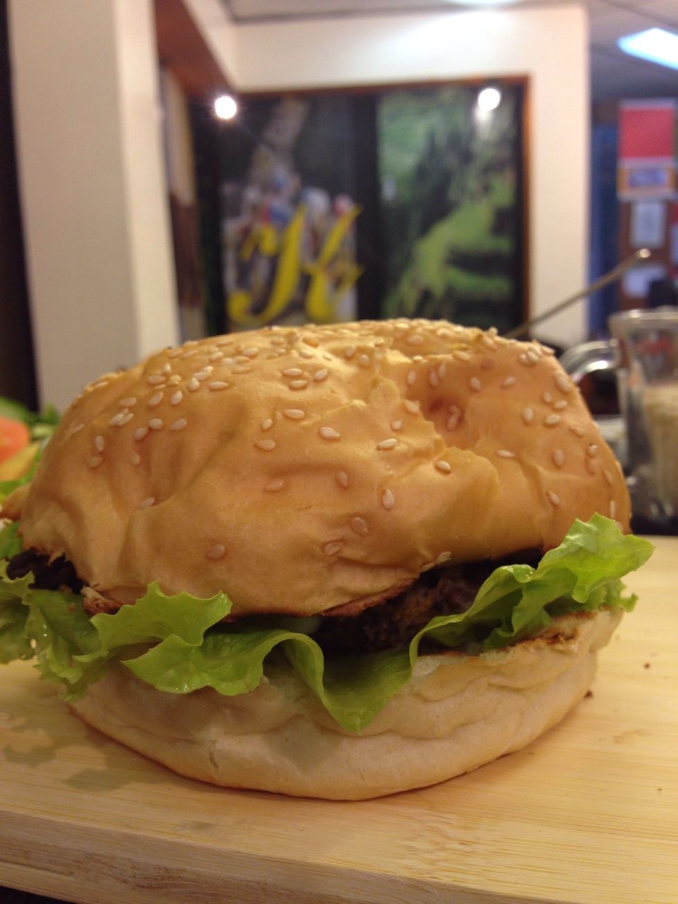 prepare your burger the regular way (catsup, mayo, mustard, pickles) or the way you want it... on this picture for my dressing i used yogurt, coriander and lemon, lettuce, tomato and cucumber...