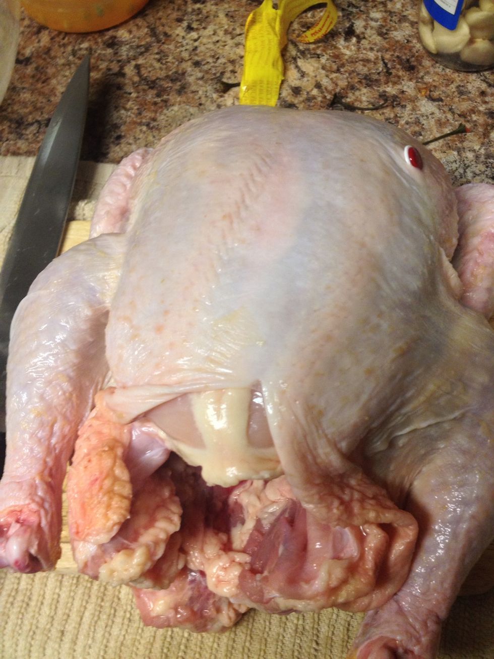 Prepare your chicken. Cut off extra trimming or skin. Remove giblets.
