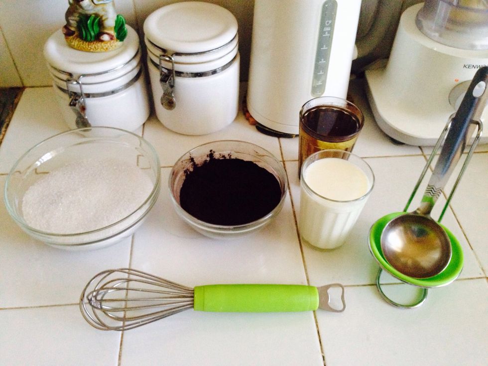 Prepare your ingredients  Milk , oil , sugar , cocoa powder ( sift the cocoa powder )