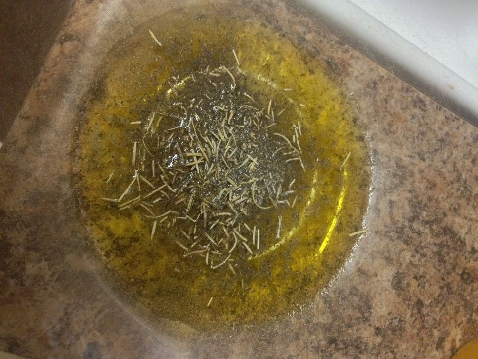 Prepare your rub. A secret to a great roast chicken is a good herb rub. Mix olive oil, rosemary, thyme, salt and paper. You can also add so,e oregano.