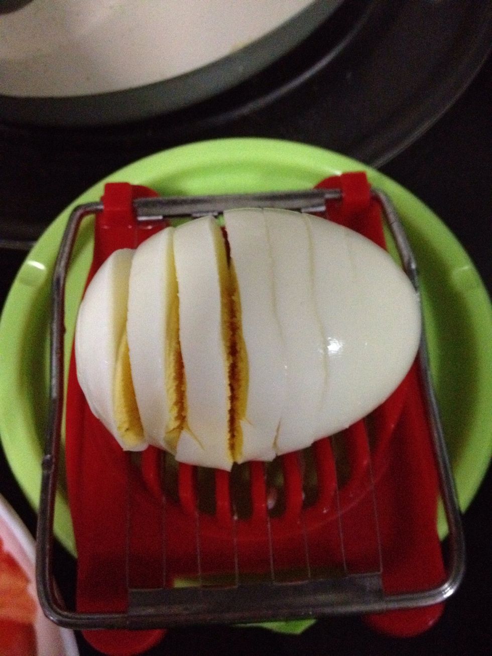 Prepare your slicer and  slice ur eggs