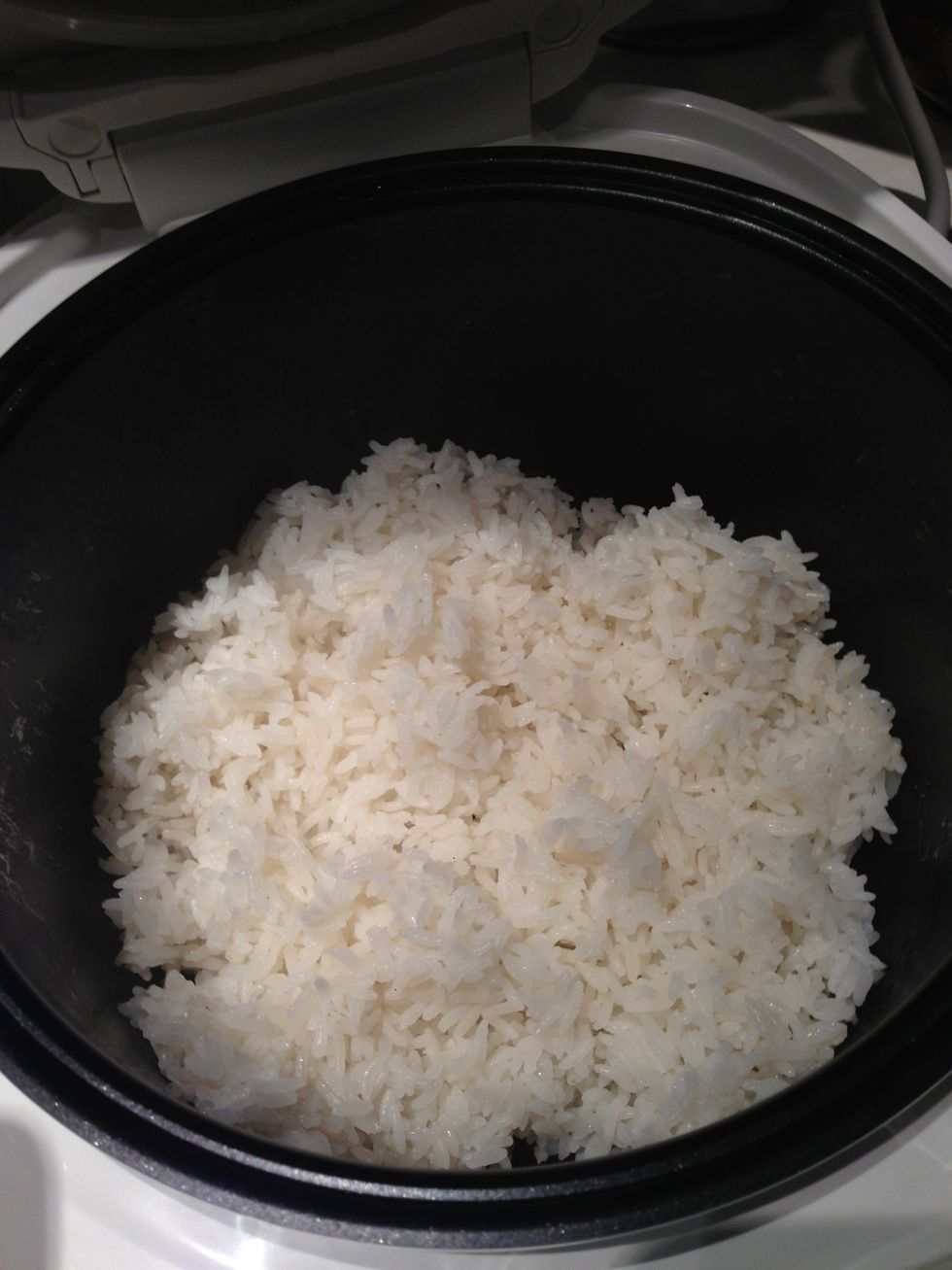 Preparing the coconut rice: Step 1: rinse the grains (3 times) Step 2: add coconut cream Step 3: add water & 1 tsp salt Note: 3 cups grains = 1 cup water & 2 cups coconut cream