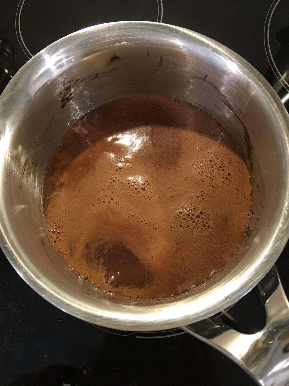 Preparing the syrup: in a saucepan, put 500ml water+100g glucose+ 130g sugar. Bring to a boil. Add 30 g cacao. Mix well. (Better use the hand blender) Bring to a slow simmer 2-3