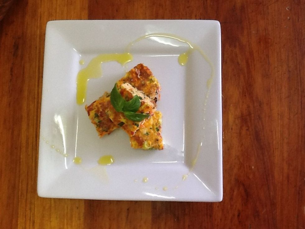 Present with basil leaves and olive oil