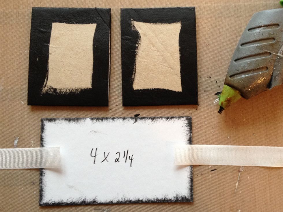 Press a toilet paper roll flat ( wet it a bit and lay something heavy over for a day) Cut it in 2 even parts and paint around.