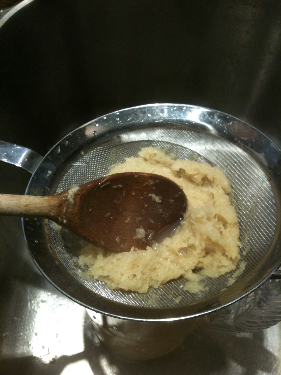 Press all of the good liquid through the strainer. If using raw honey in place of sugar (for a great cold/cough remedy), then stir that into the liquid while it is hot so the honey can dissolve.