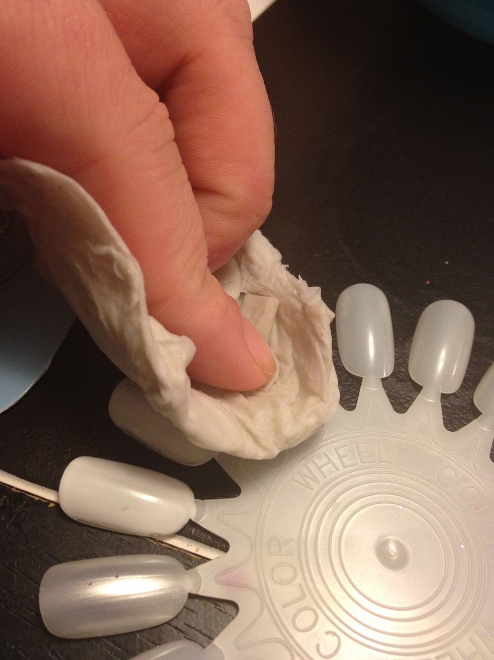 Press and hold firmly. Don't Dab, or move the napkin, it will slip up and mess up your tattoo. Press and hold.