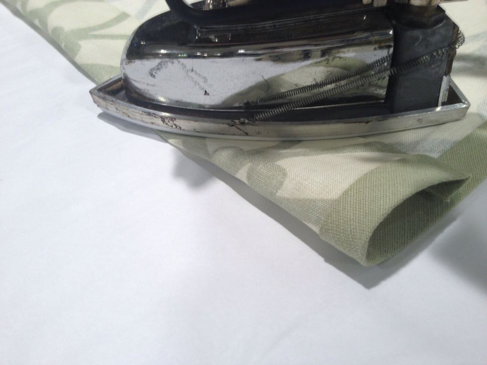 Press and steam the rod pocket thoroughly with the iron.