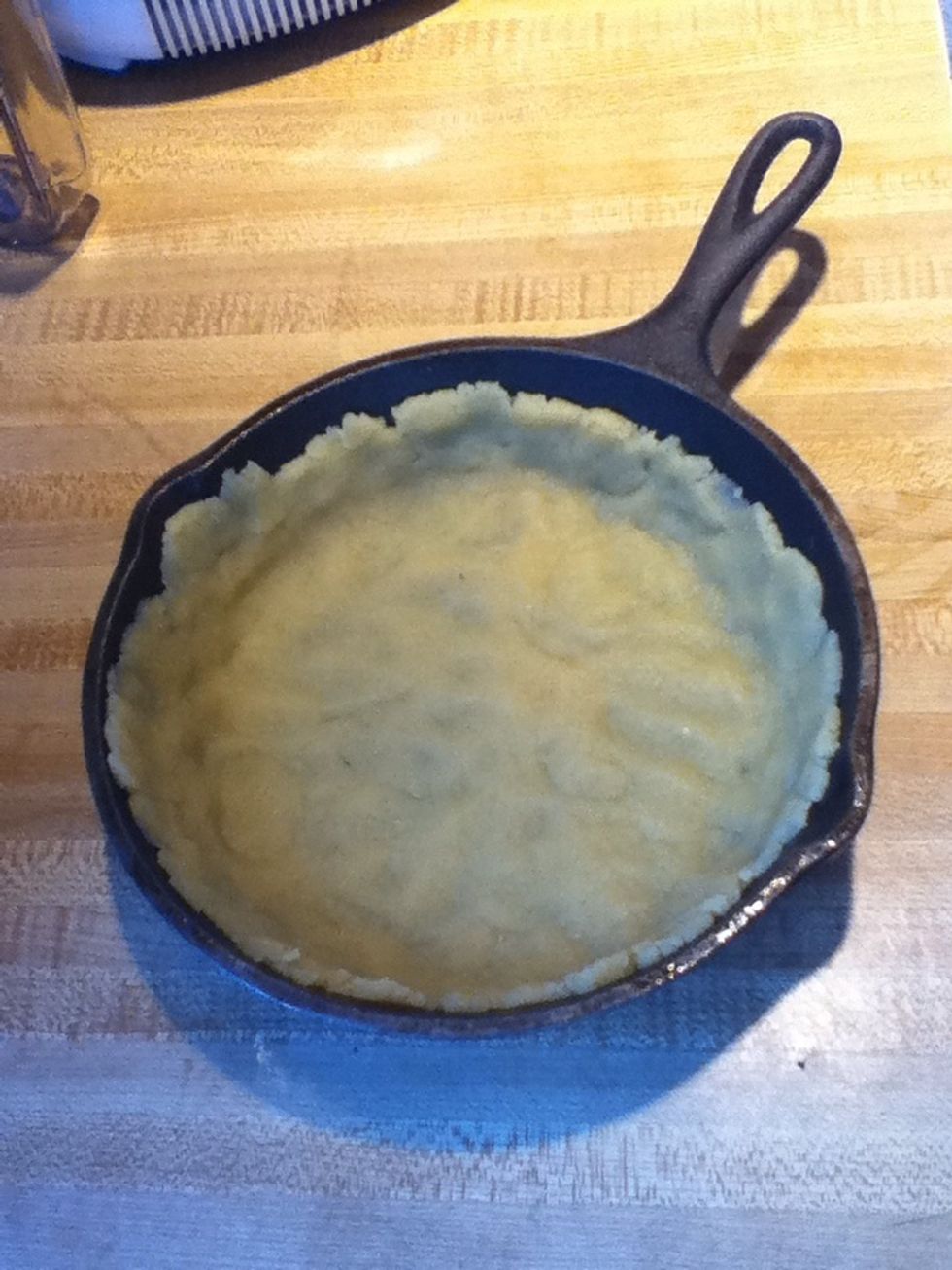 Press dough into 9-inch pie pan or I used a 9-inch skillet. Bake at 350F for 8 to 10 minutes.