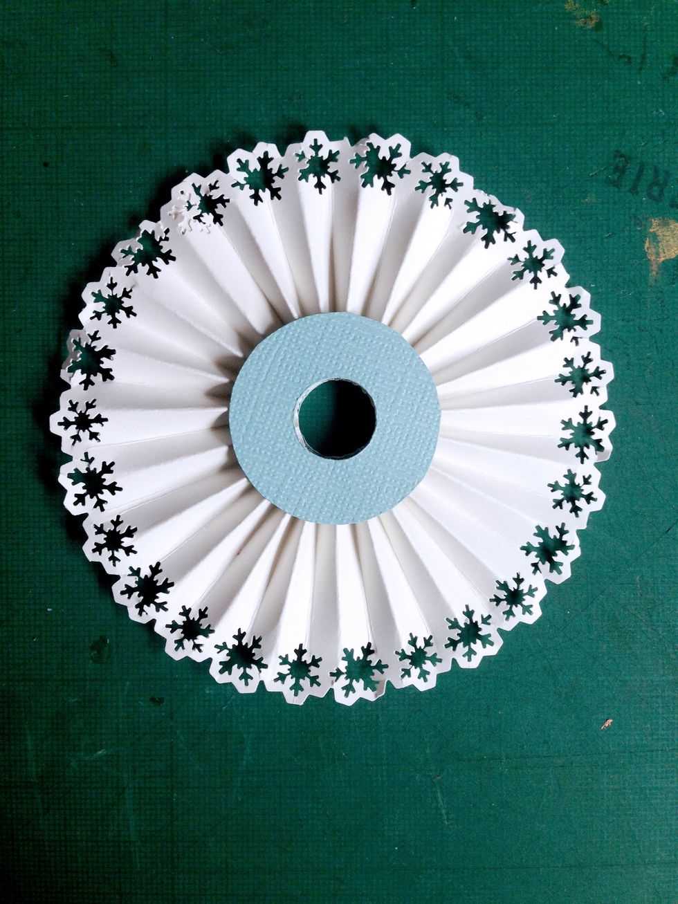 Press down and flatten the white rosette and sandwich in between the 2 circles (from Step 16) as shown... You will need to glue them down to secure them...
