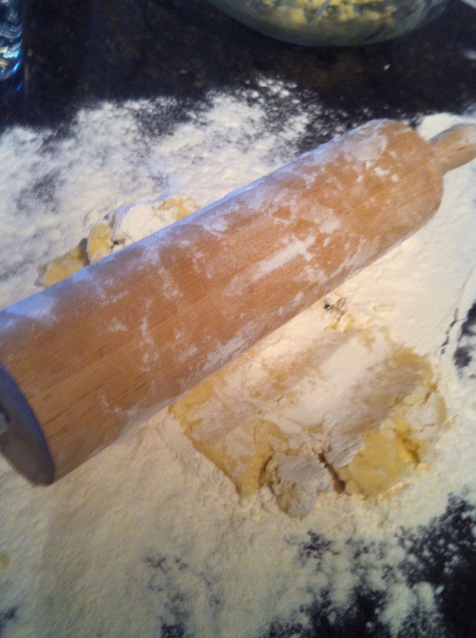 Press down gently with rolling pin on roll out a couple times. Do the same in the opposite direction so your dough is evenly spreading out on your surface.