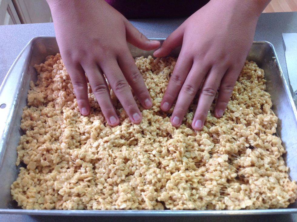 Press down with buttered fingers until flat.