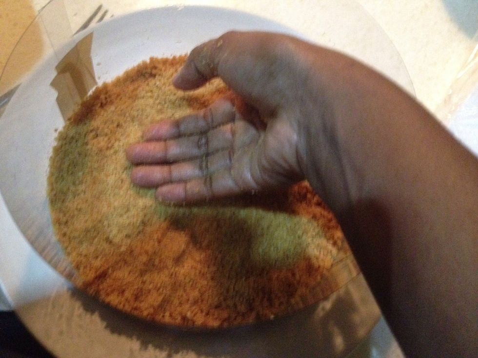 Press down with hand or back of a spoon