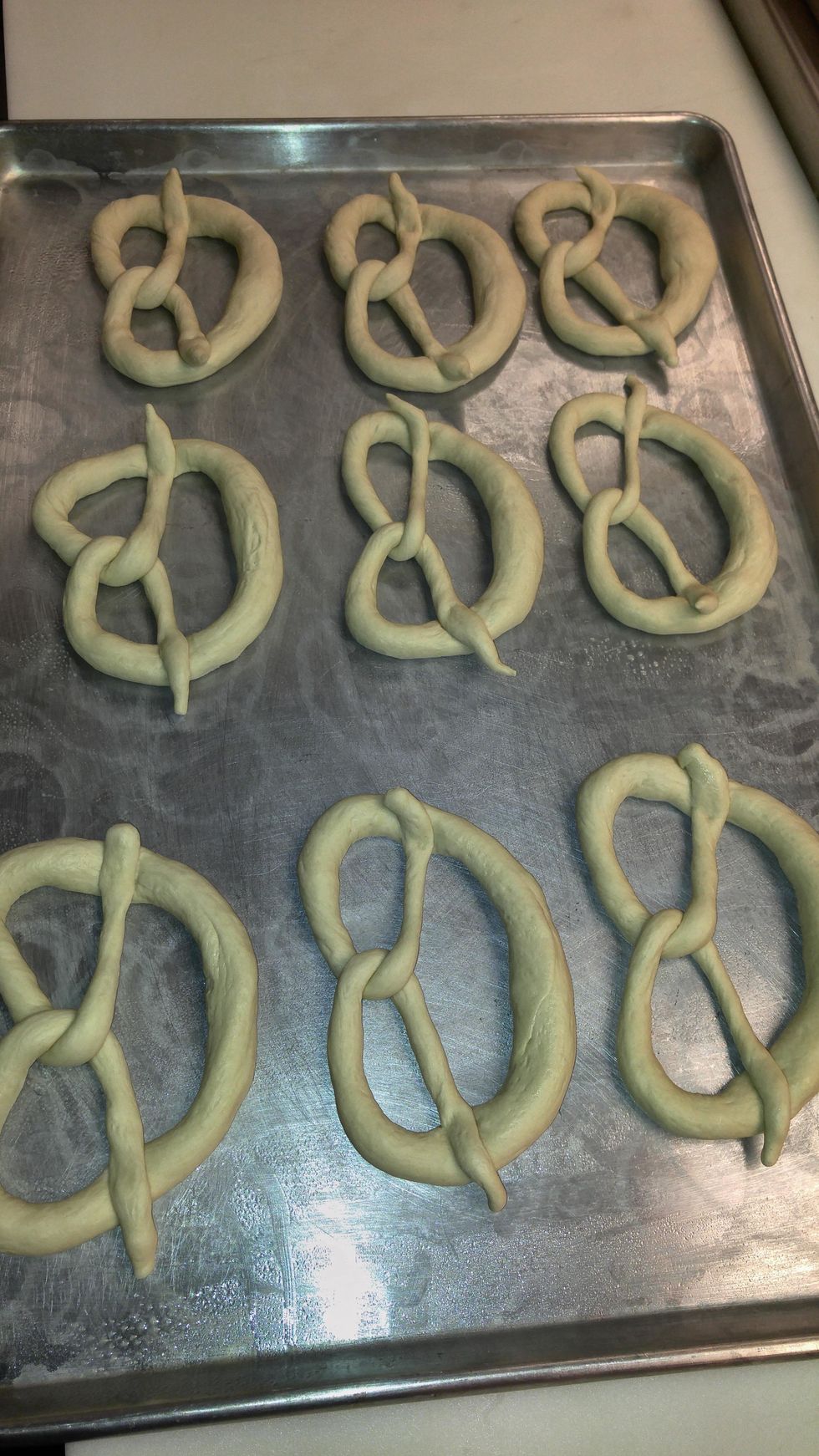 press ends into the sides and place on a lightly sprayed sheet pan and put in the cooler uncovered for 10-15 minutes.