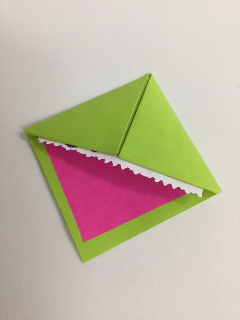 Press into place. This allows the mouth to open around the corner of your book page.