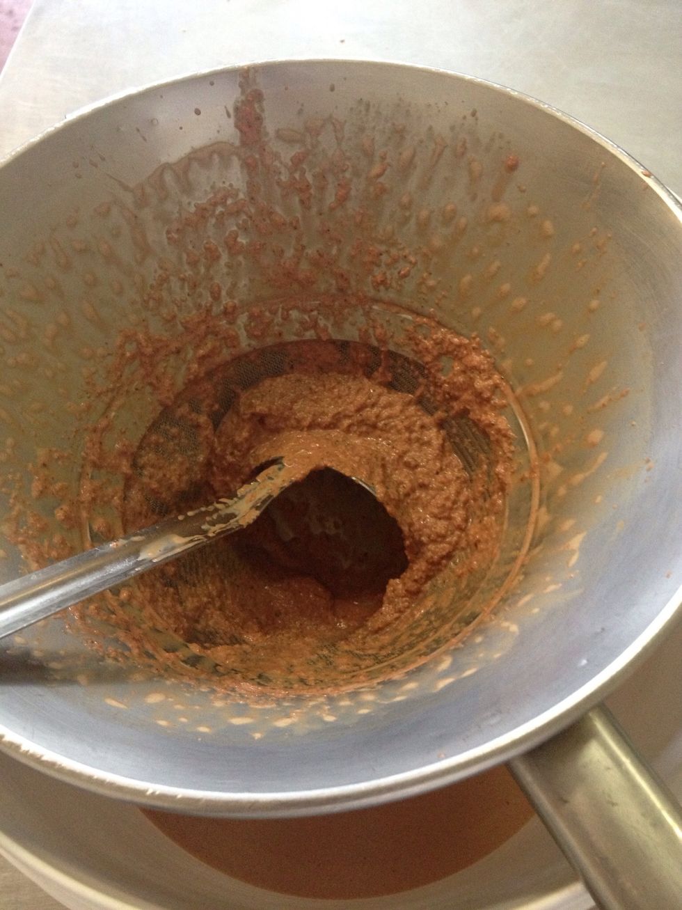 Press it through and discard what's left