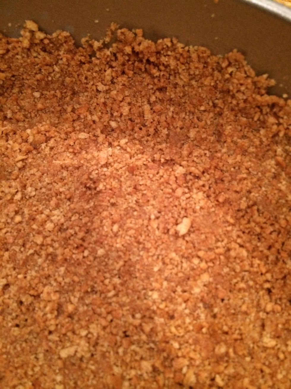 Press mixture evenly across the bottom of the pan and about one inch up the sides