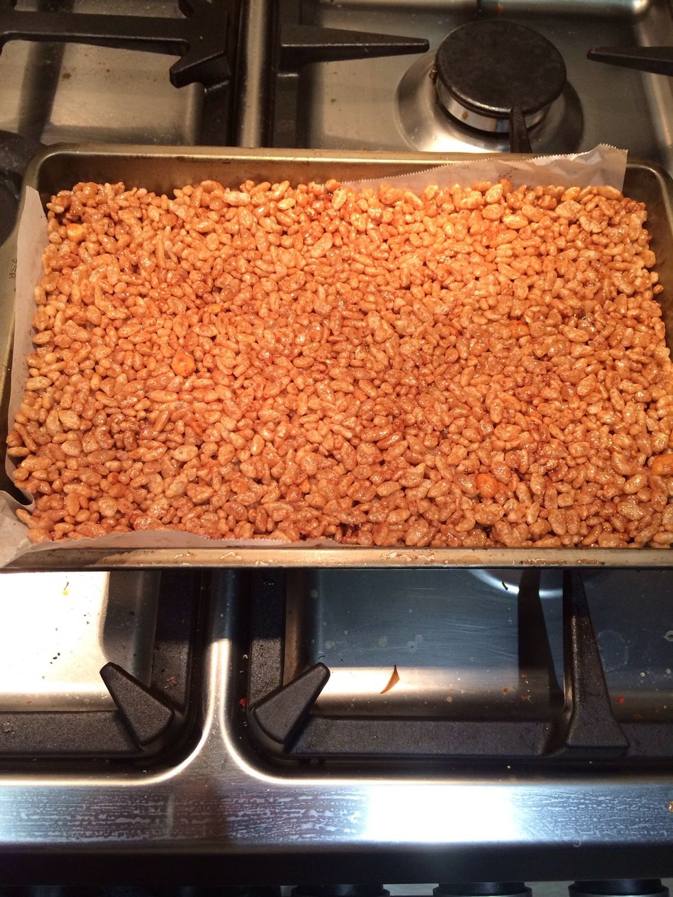 Press mixture firmly into lined tray.