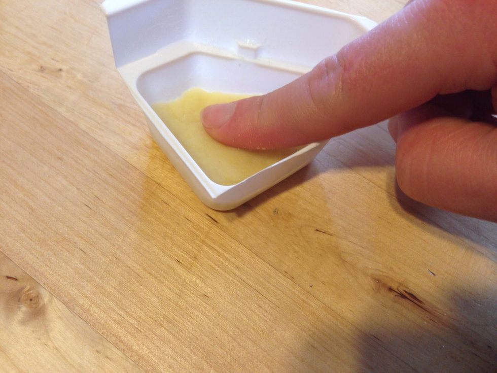Press potato dough flat to bottom of tray so the dough takes the shape of the tray mold In Order to form the fry shapes-