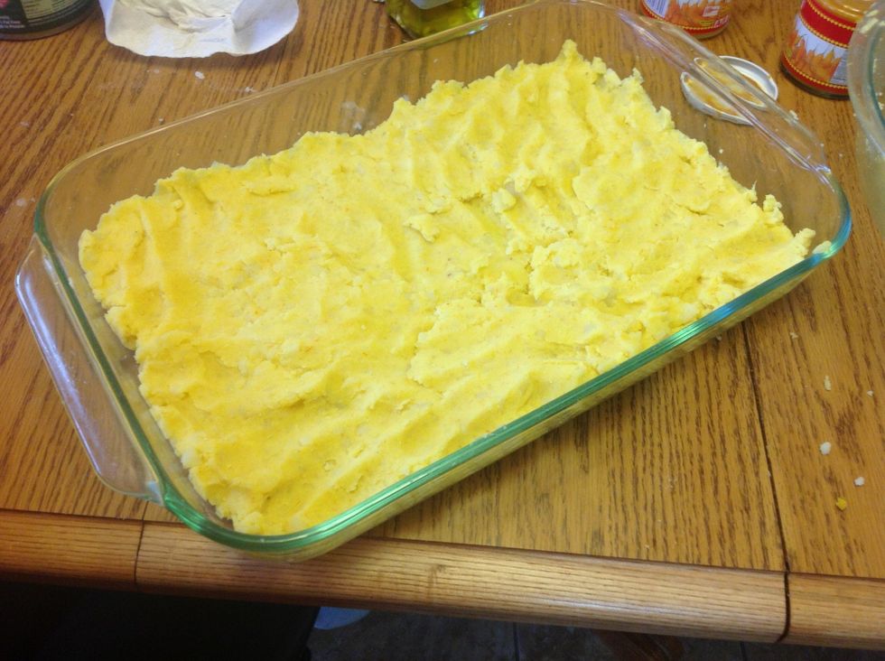Press potatoes into the pan